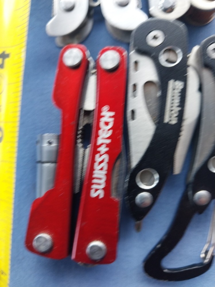 4 small multitudes with pliers knife scissors screwdriver's