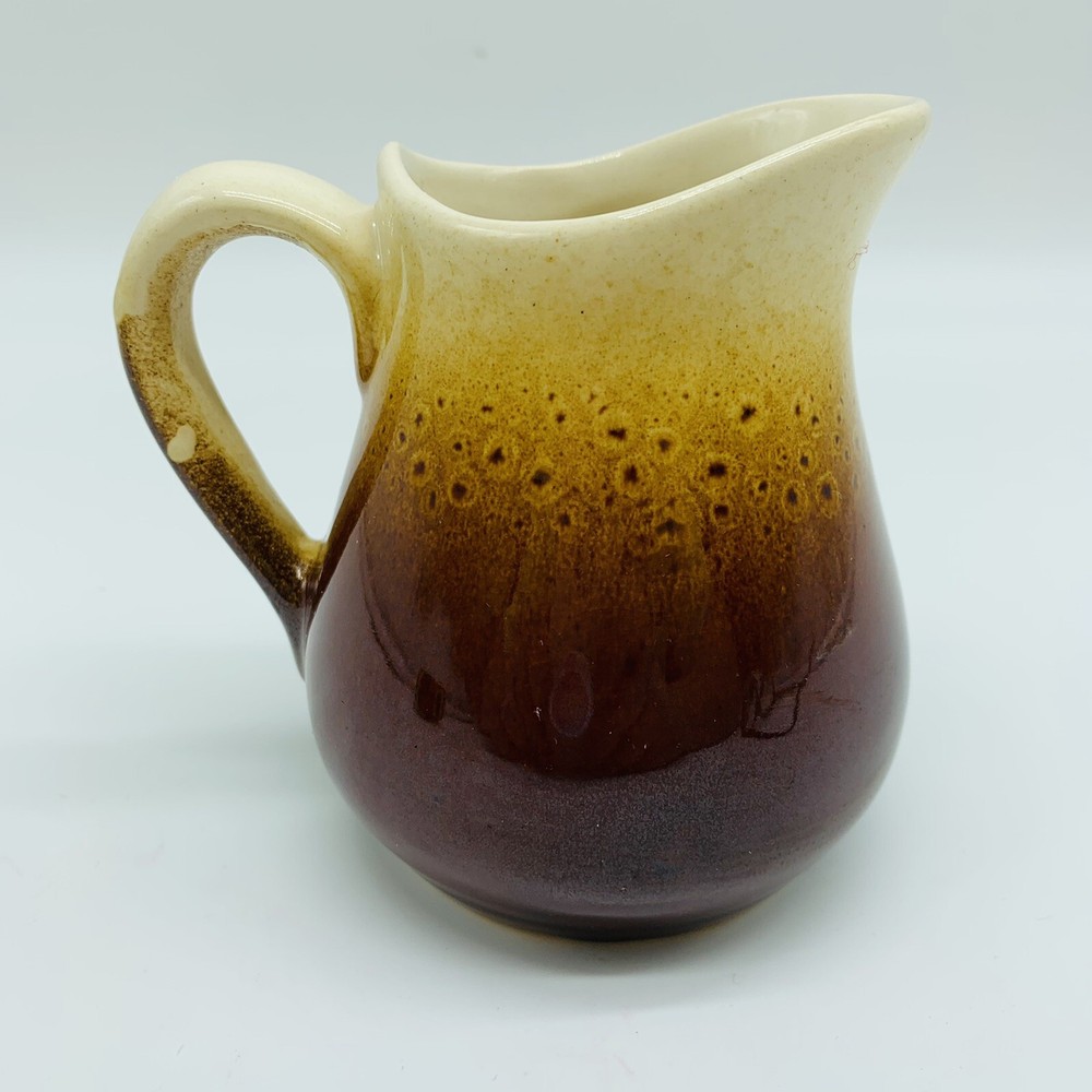 Small brown and white creamer 4.5”