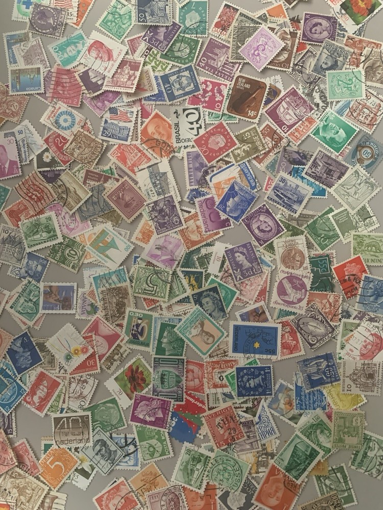 100+ Different Small Worldwide Stamps