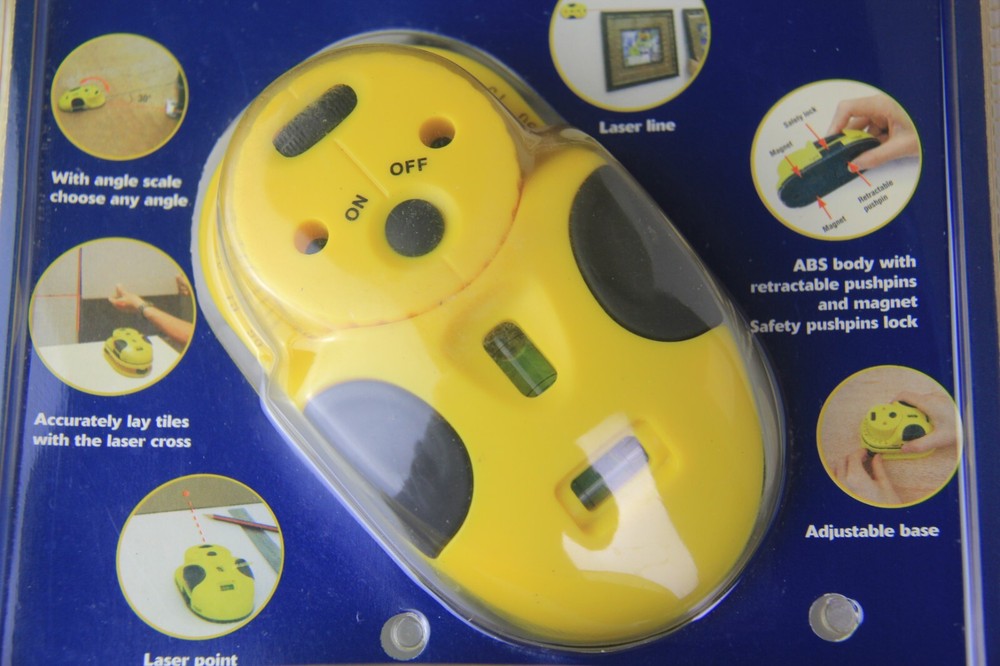 Benchtop swivel laser level with adjustable base