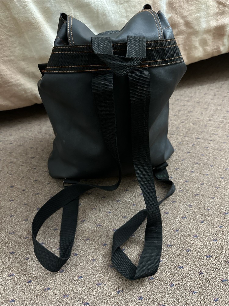 vintage-style black leather backpack