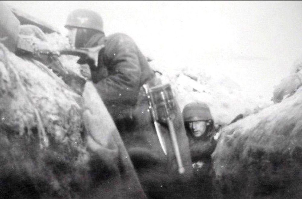 German Folding Entrenching Tool in Carrier.