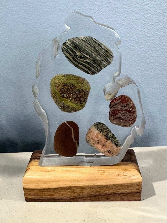 Rocks in resin on walnut base