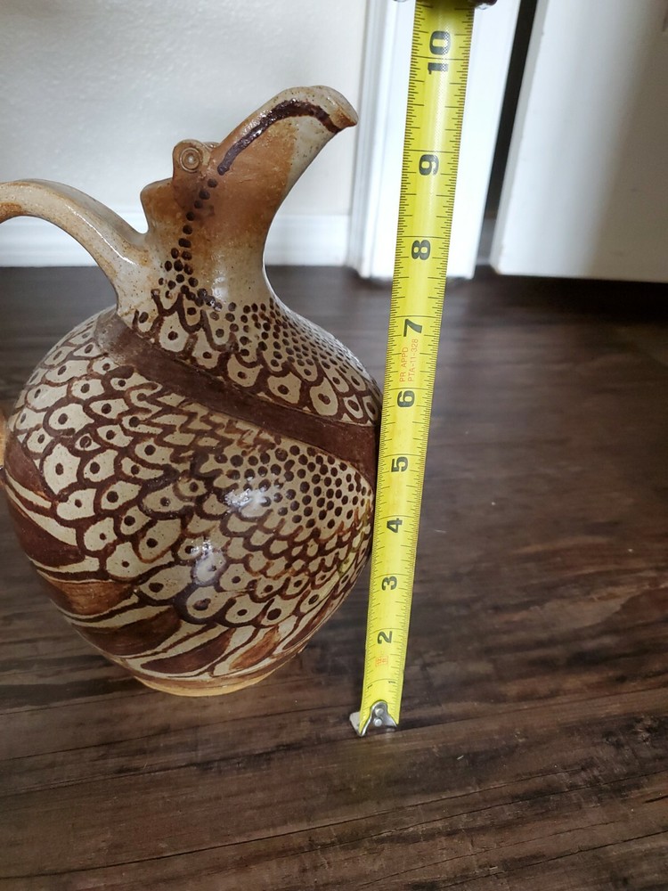 Amazing Pottery Pitcher Signed SF