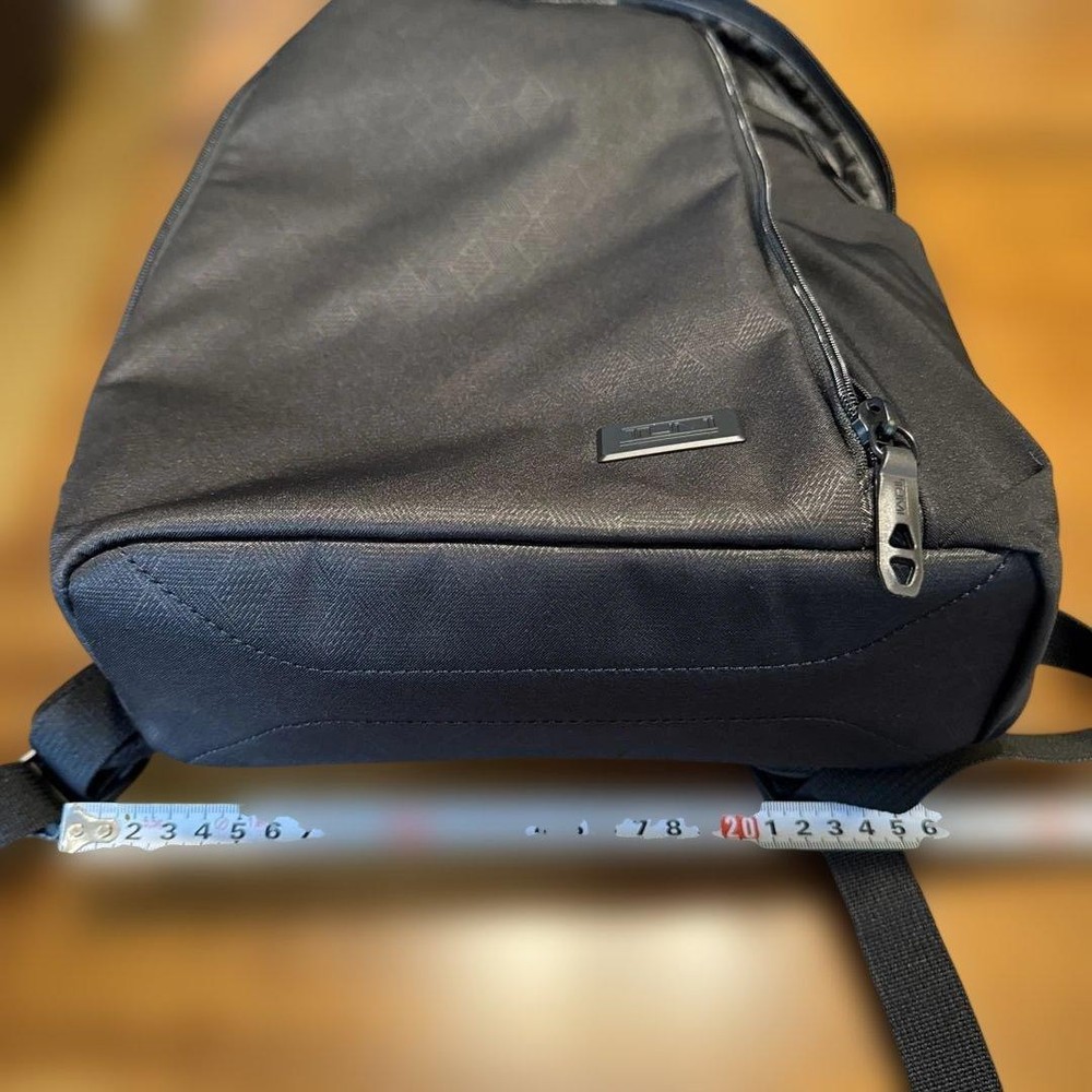 TUMI geometric pattern black backpack