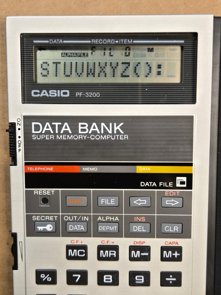 Casio PF-3200 DATA BANK Super Memory Computer / Calculator MINT in Box Works