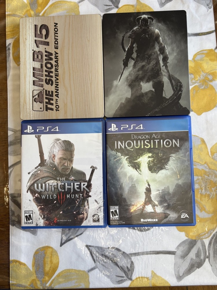 Sony PlayStation 4 1TB Bundle with Controller, Cords, and Games