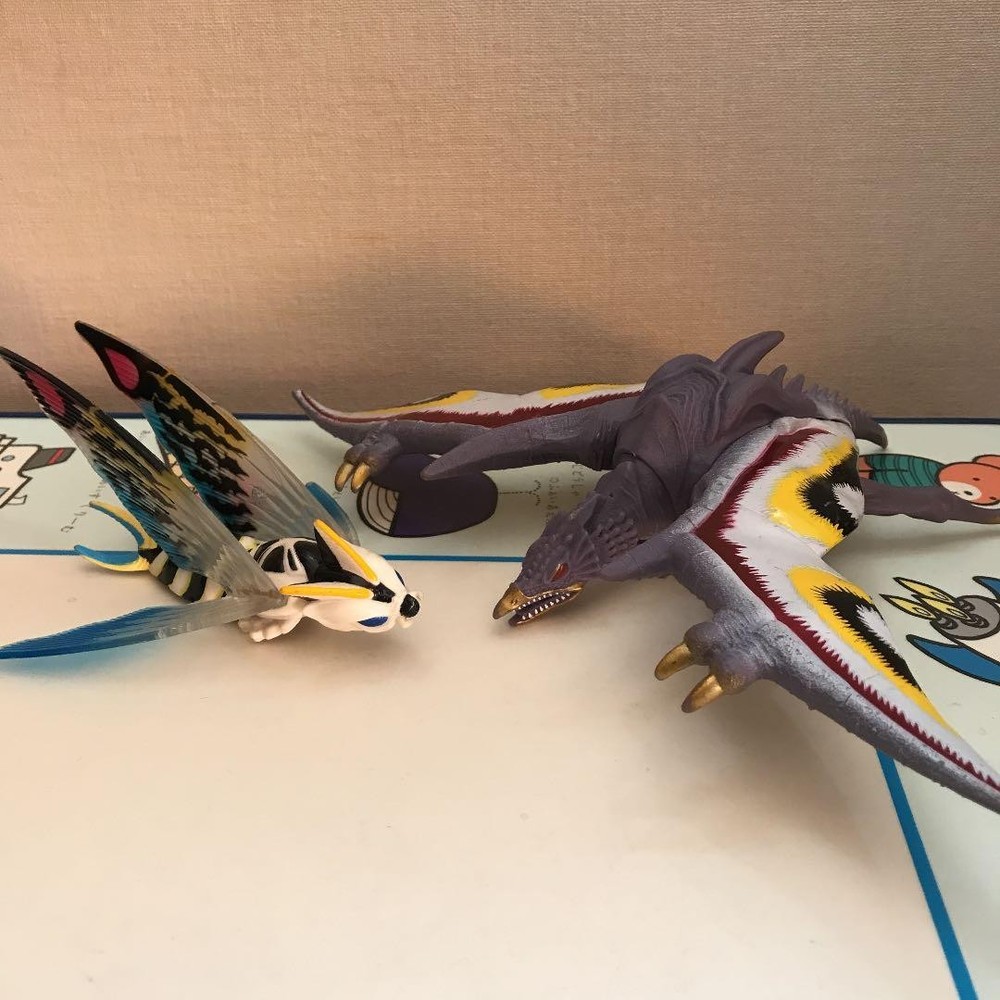 Monster figures such as King Ghidorah