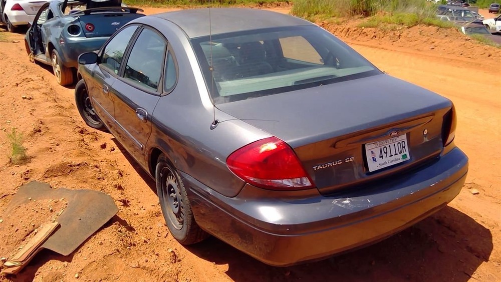 Passenger Side View Mirror Power Fixed Black Textured Fits 00-07 TAURUS 242558