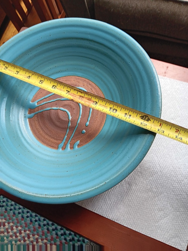 pottery blue and brown bowl signed. 231