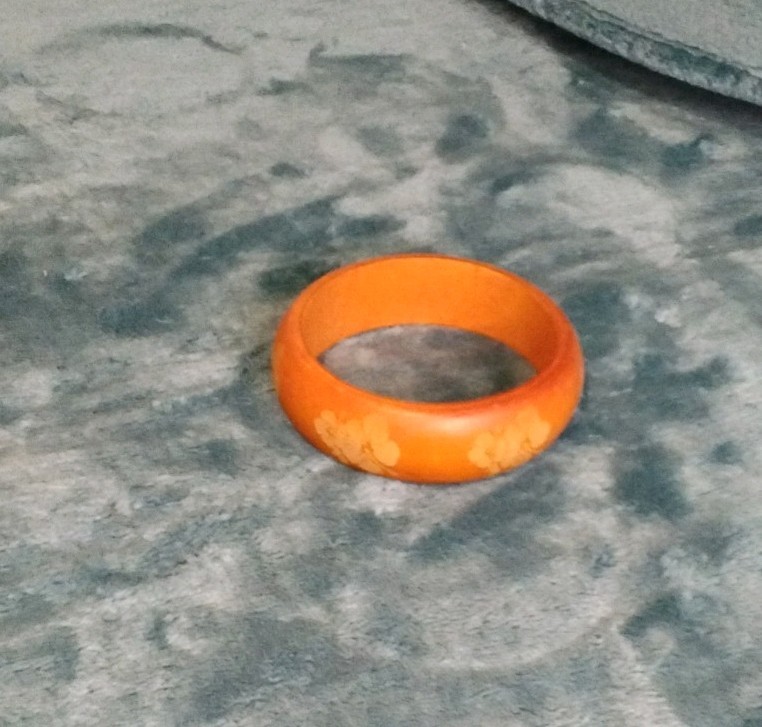 Bakelite Orange Bangle Bracelet with Floral Pattern, Vintage 3 Inch Diameter
