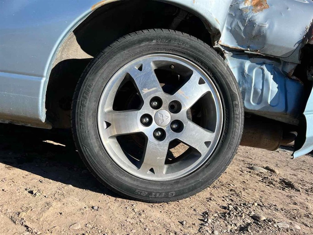 Used Front Left Steering Knuckle fits: 2003 Mitsubishi Eclipse Cpe w/o ABS Front