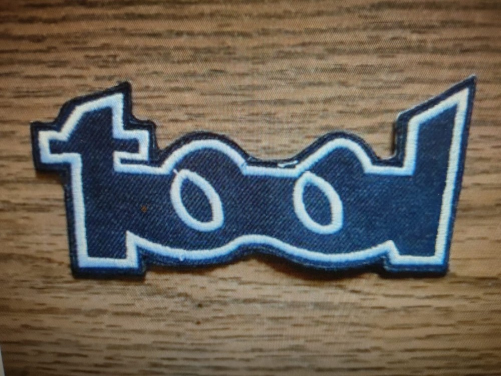 TOOL,IRON ON WHITE EMBROIDERED PATCH