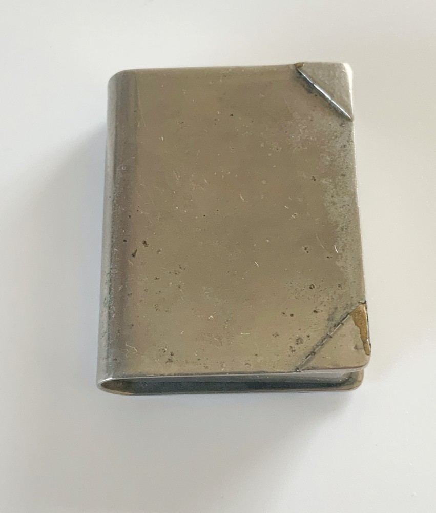 WWII era trench art lighter book