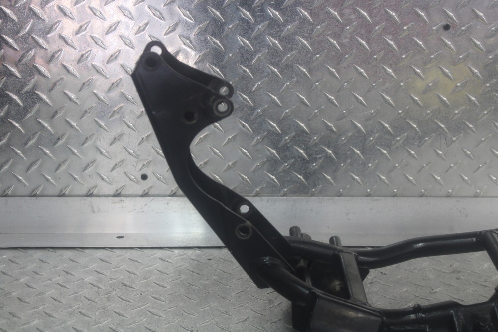 2004 SUZUKI GZ250 LOWER FRAME RAIL FOOTPEG BRACKET MOUNT