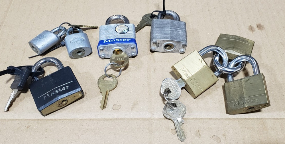 6 Master Locks Padlocks and 2 smaller Corbins