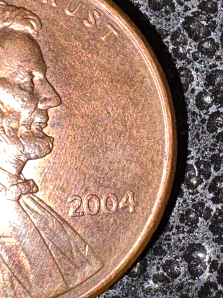 2004 no Mint U.S. Penny with "Smiling" Lincoln