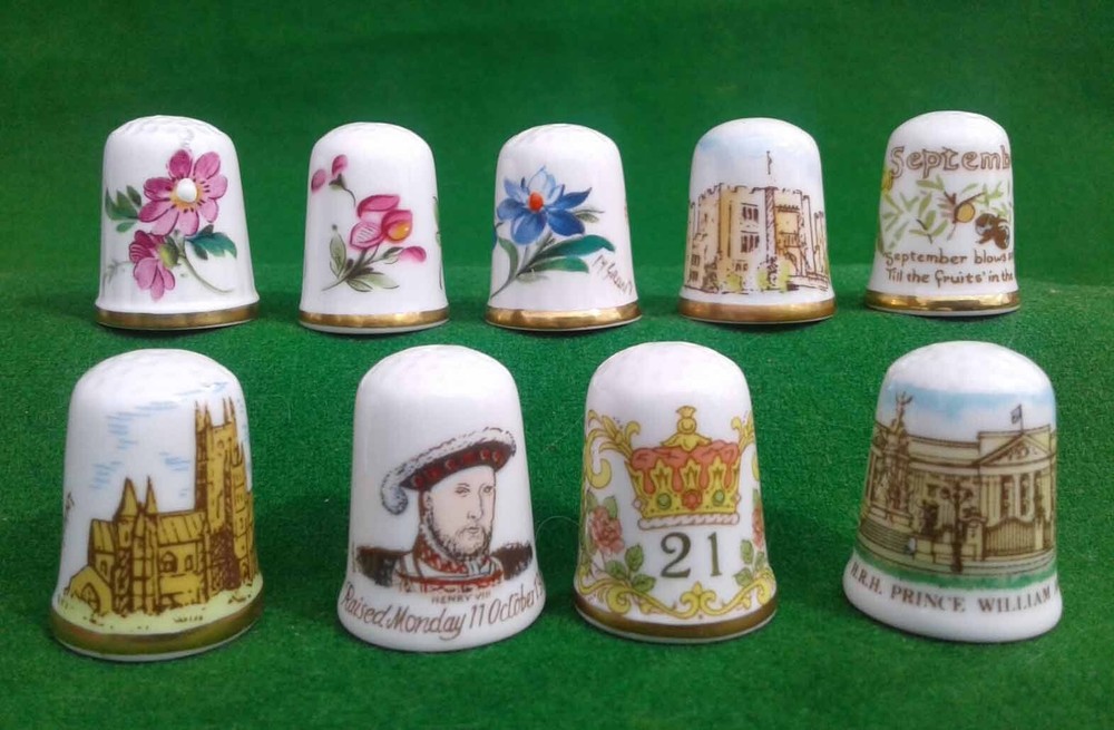 9 CAVERSWALL BONE CHINA THIMBLES.