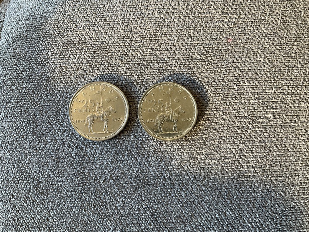 2 1973 canadian rcmp centennial quarters