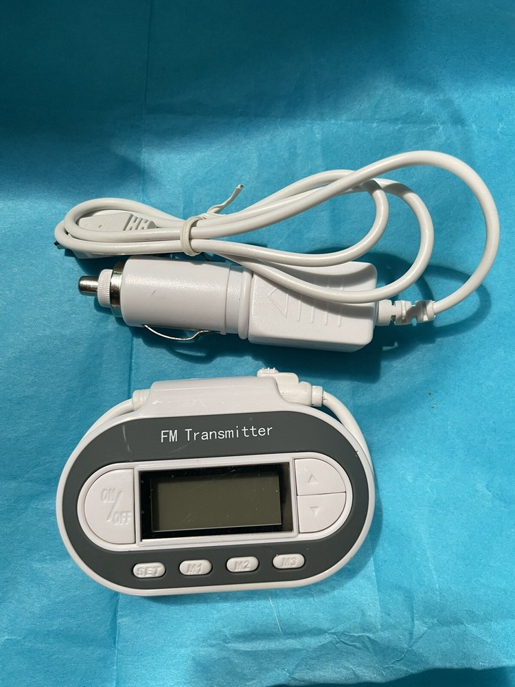 In Car FM Transmitter w Charger Model SP2202