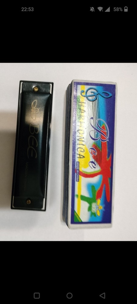 LIP HARMONICA SMALL POCKET SIZE LIGHT WEIGHT COMFORTABLE NEW IN BOX.