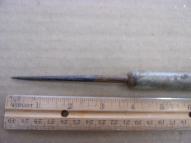 vintage spring loaded cast awl