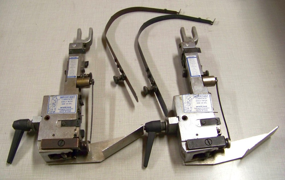 Two ACME Champion Interlake Stitcher Heads