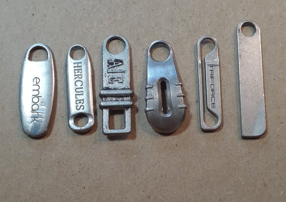 Lot of (6) Assorted Luggage Replacement Zipper Pulls.