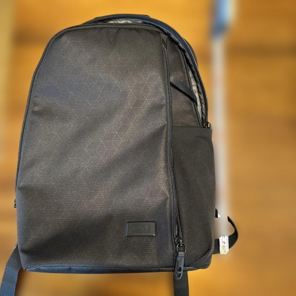 TUMI geometric pattern black backpack