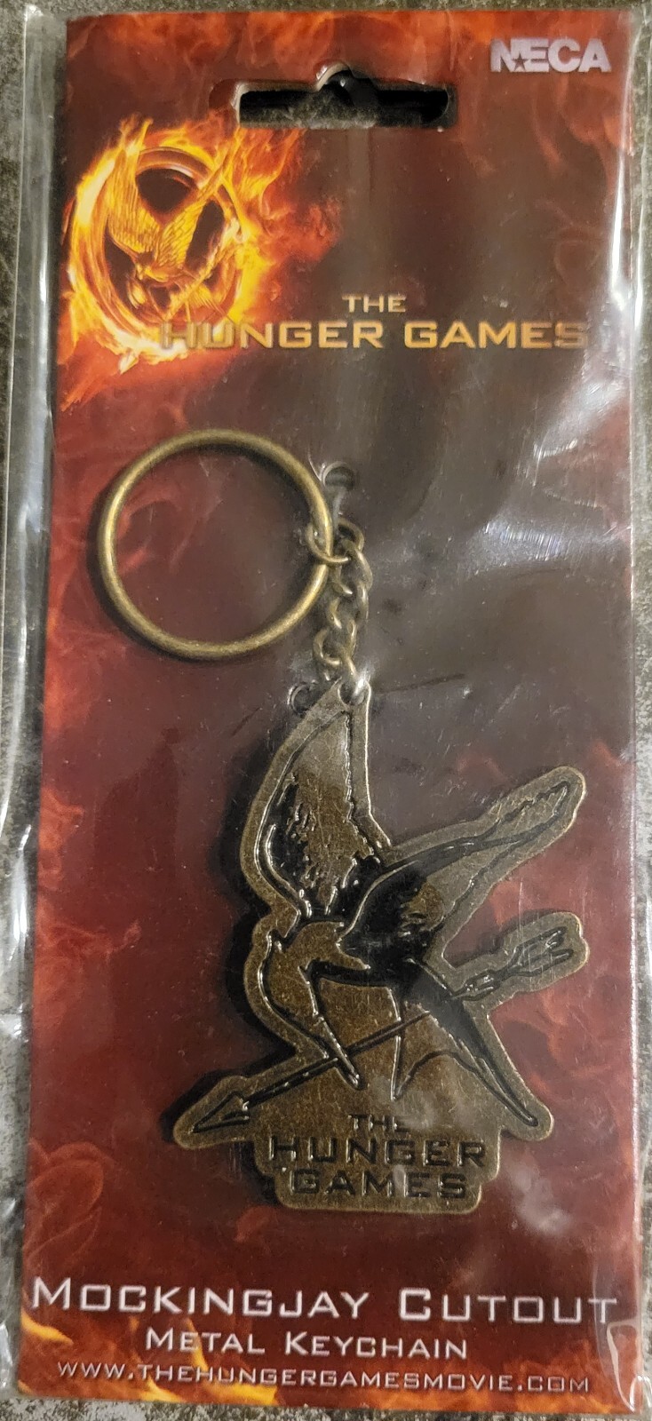 The Hunger Games Mockingjay Cutout Metal Keychain NECA 2012 Lions Gate Films TM