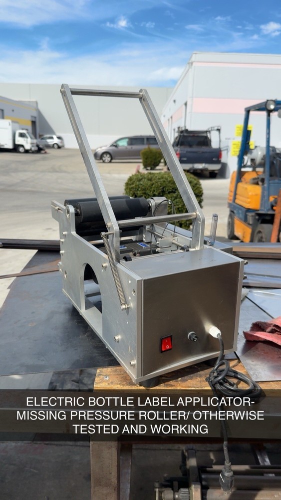 ELECTRIC BOTTLE LABEL APPLICATOR- USED