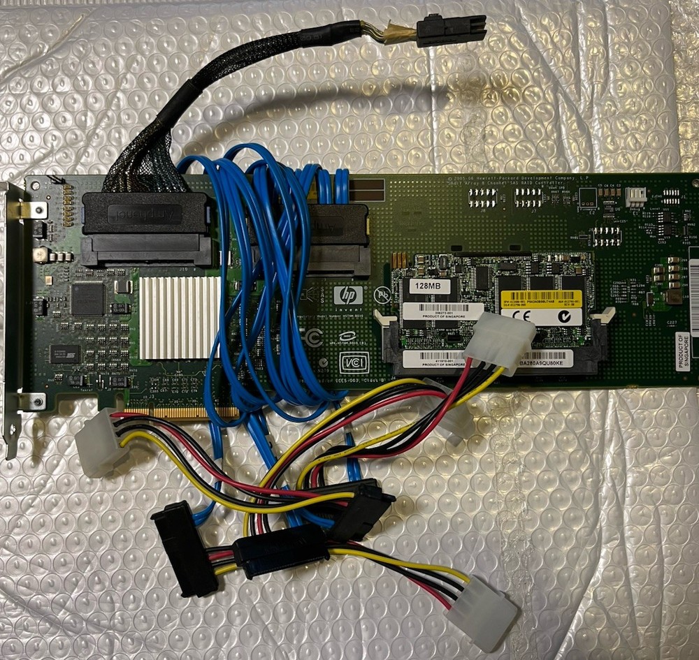 HP Smart Array (HSTNM-B010) Raid Controller 411510-001 + 128MB Cache plus cables