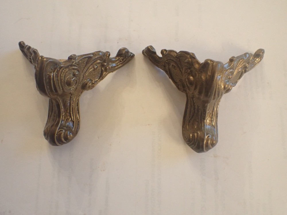 TWO FRONT FEET FOR BLACK MANTEL CLOCK