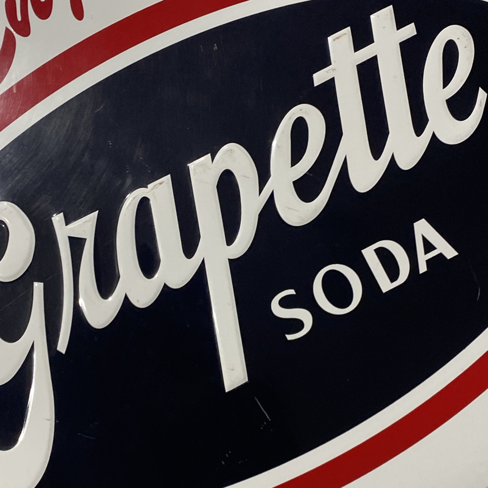 Grapette Bottle Cap Sign Metal Embossed 26.5” Stout Sign Co