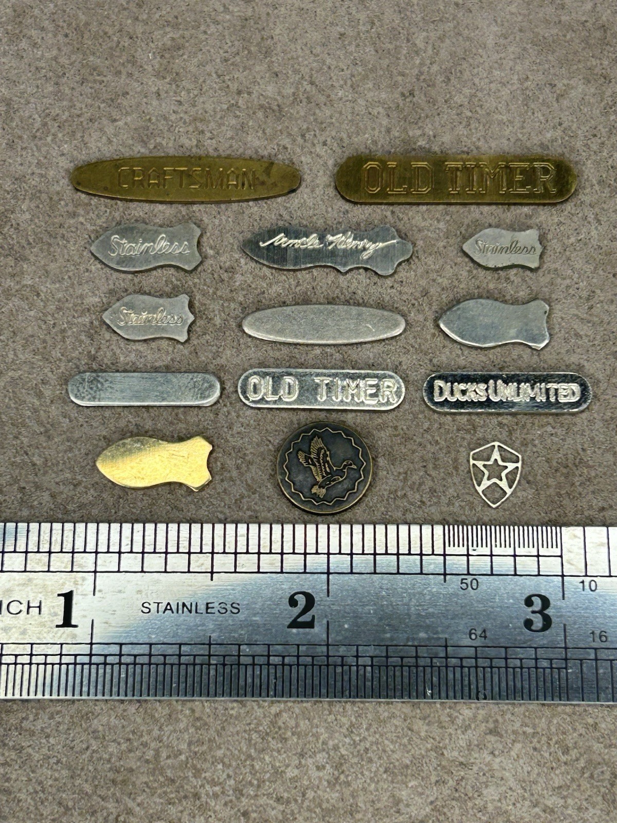 14 Lot Knife Shields/Badges Old Timer, Schrade, Craftsman, Ducks Unlimited, Etc.