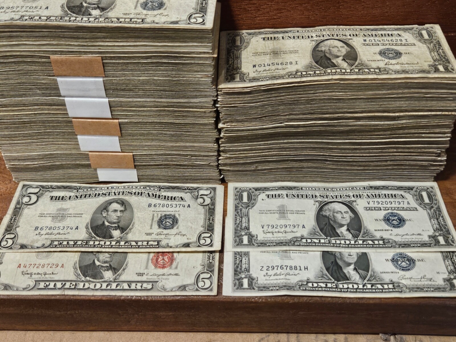 4 notes. 1953 Red Seal $5, $5 Silver cert, 1953 $1, 1935 $1 silver certificate