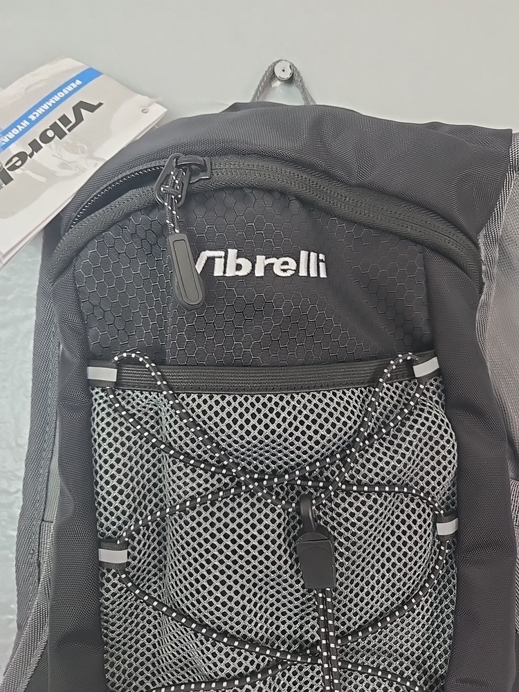 Vibrelli Hydration Backpack & 2L Hydration Bladder - High Flow Bite Valve. New.