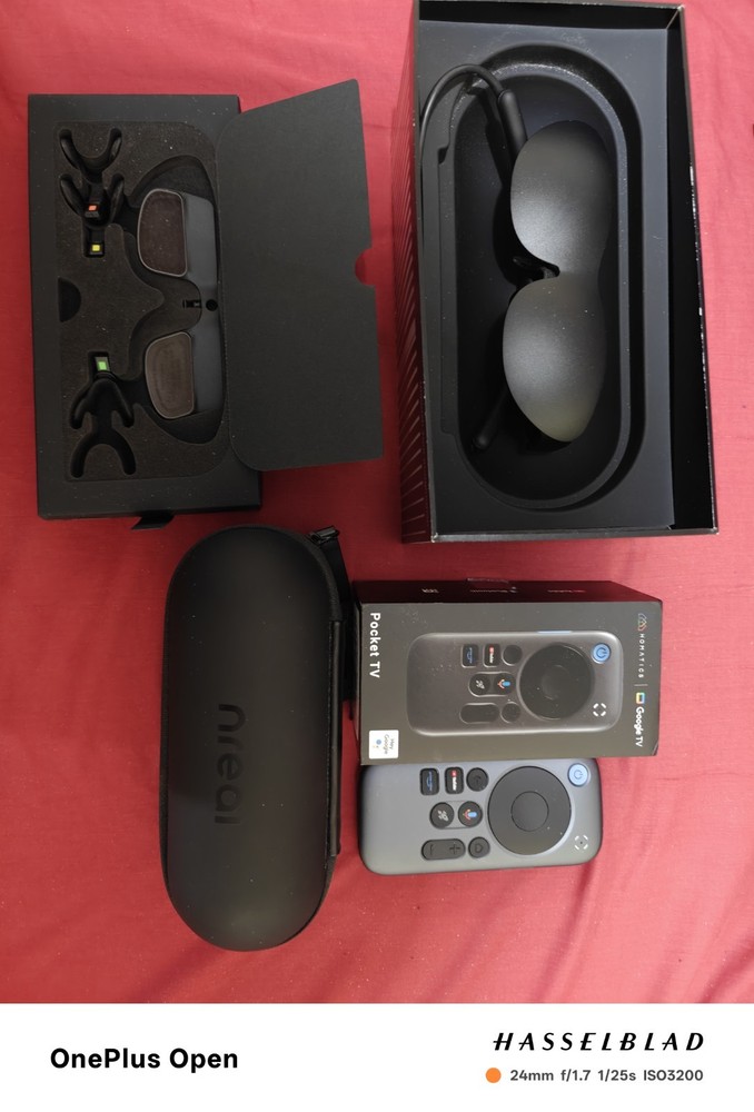 Nreal Light AR Glasses Micro OLED Screen + Android Pocket TV Handheld device.