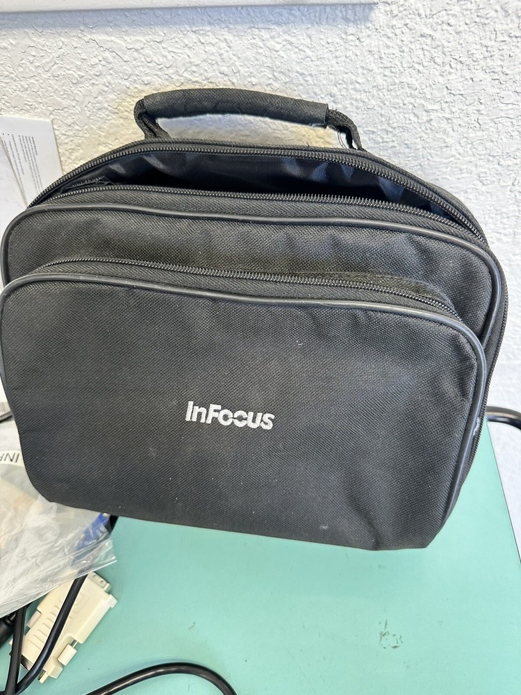 InFocus Projector IN1100 Model: W1100 w Manuals, cables, carrying case