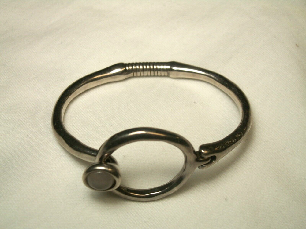 ...Unode50...Silver Tone, Quartz Hinged Bracelet...