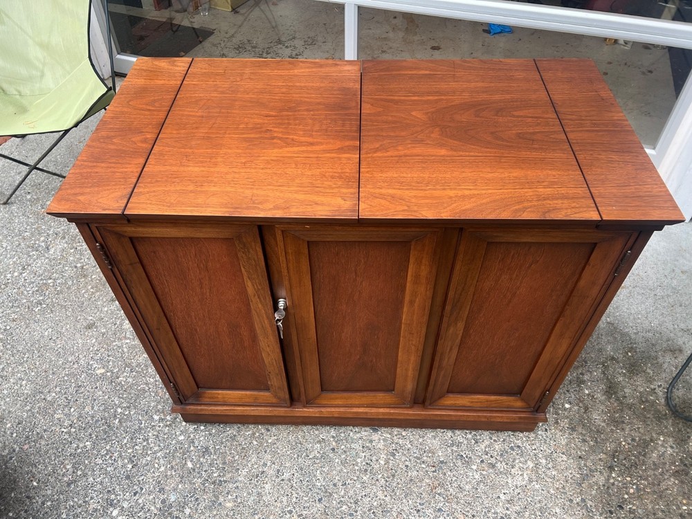 Jasper Cabinets Mid Century rolling walnut bar