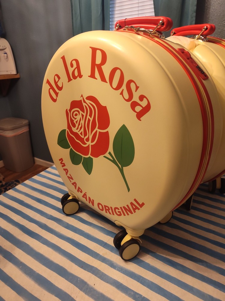 de la rosa marzipan rolling suit case