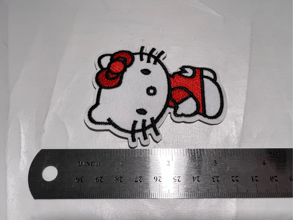 Hello Kitty Looking Over Shoulder Iron on Patch