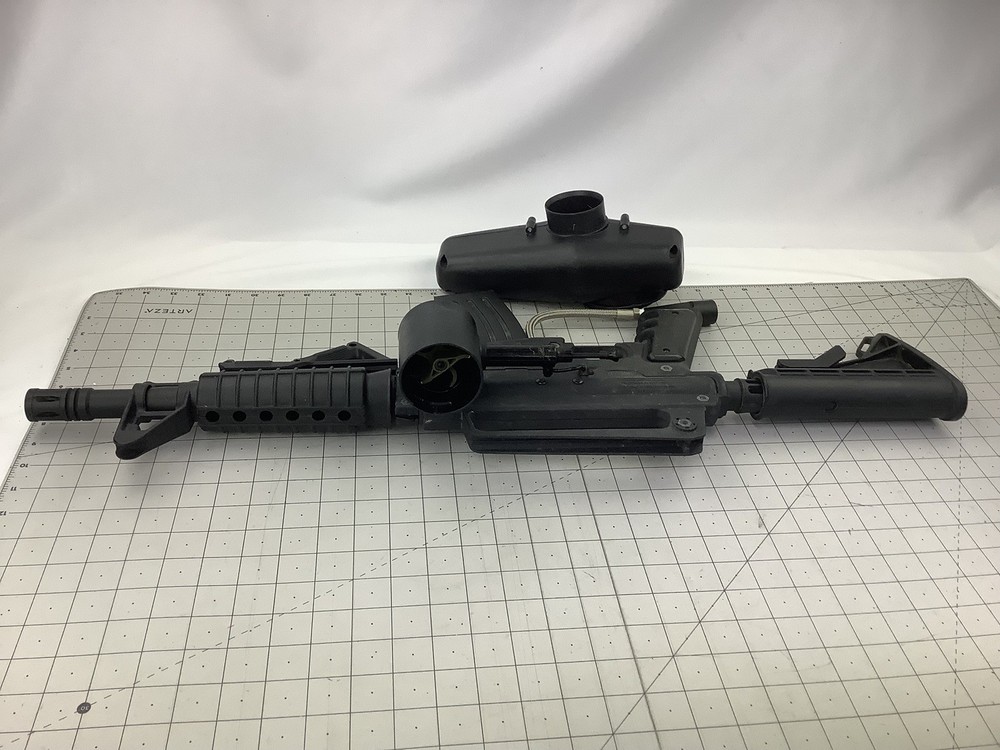 Tippmann Alpha black paintball marker with e trigger and cyclone feed untested
