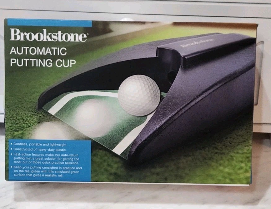 NIB! Brookstone Automatic Putting Cup