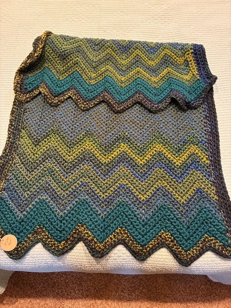Emerald green crocheted lap blanket - polyester blend