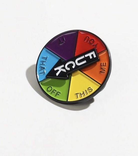 Funny Lapel Pin. Spinning Pointer.