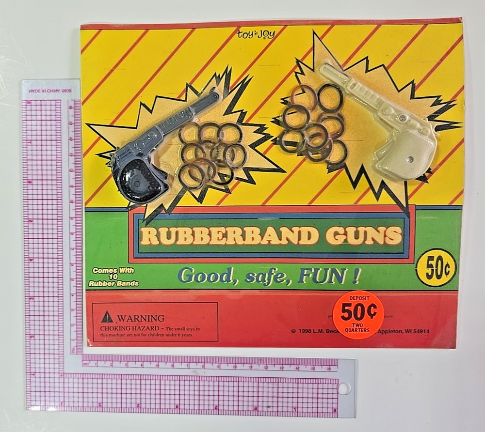 Vintage Vending Display Board Rubberband Guns 0632