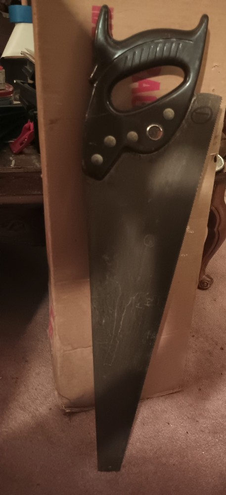 Dark Brown Handled Saw