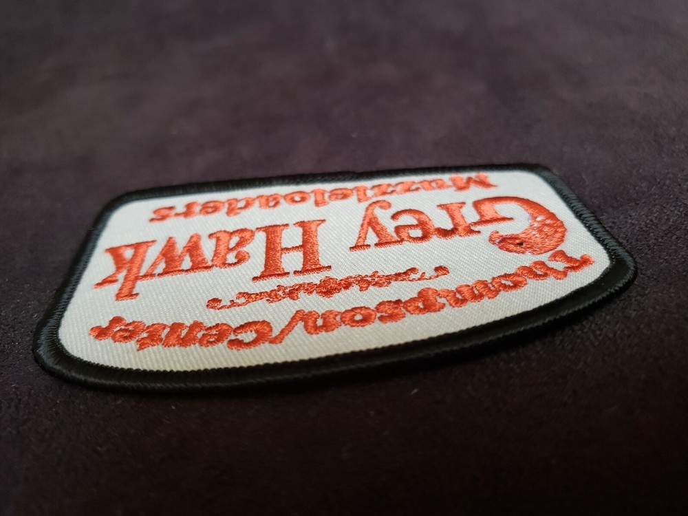 Thompson/Center Grey Hawk Muzzleloaders Embroidered Patch 3.25" Red Grey Black